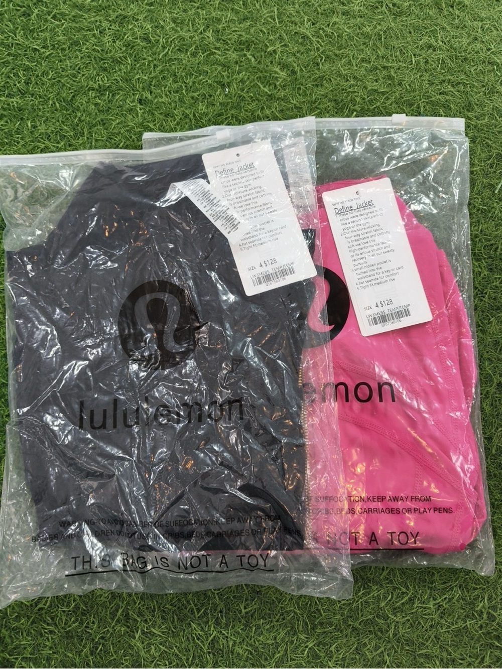 Lululemon define jacket in Black and Hot Pink